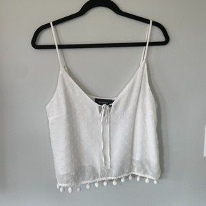 White pom pom top